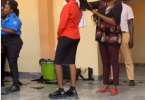 Outrage trails viral video of university staff cutting off female students’ braids