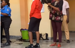 Outrage trails viral video of university staff cutting off female students’ braids