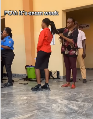 Outrage trails viral video of university staff cutting off female students’ braids