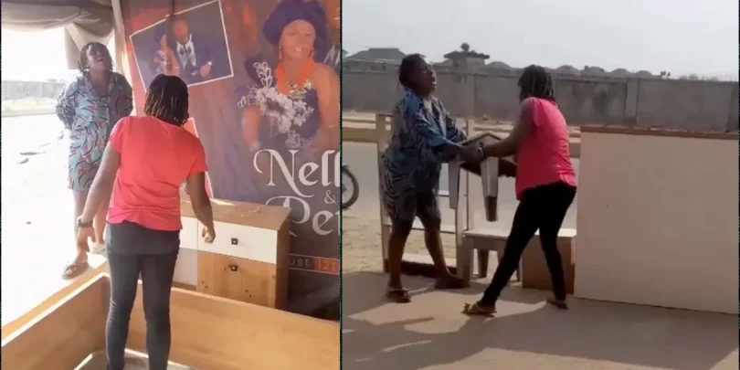 Drama as woman asks for payment after seeing her old wedding banner at a shop