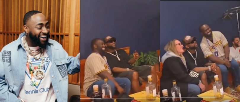 Davido Asks Overexcited Male Fan to Calm Down While Taking Picture With Him