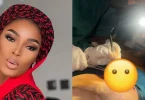 Assistant surgeon uses phone torchlight during surgery after blackout